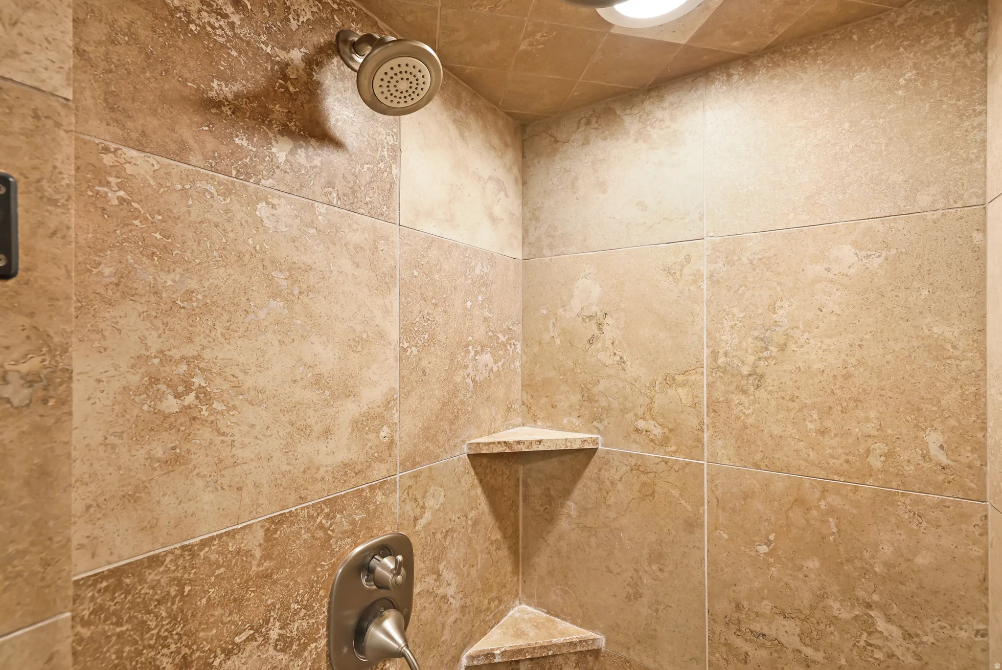 Bathroom view of tiled shower