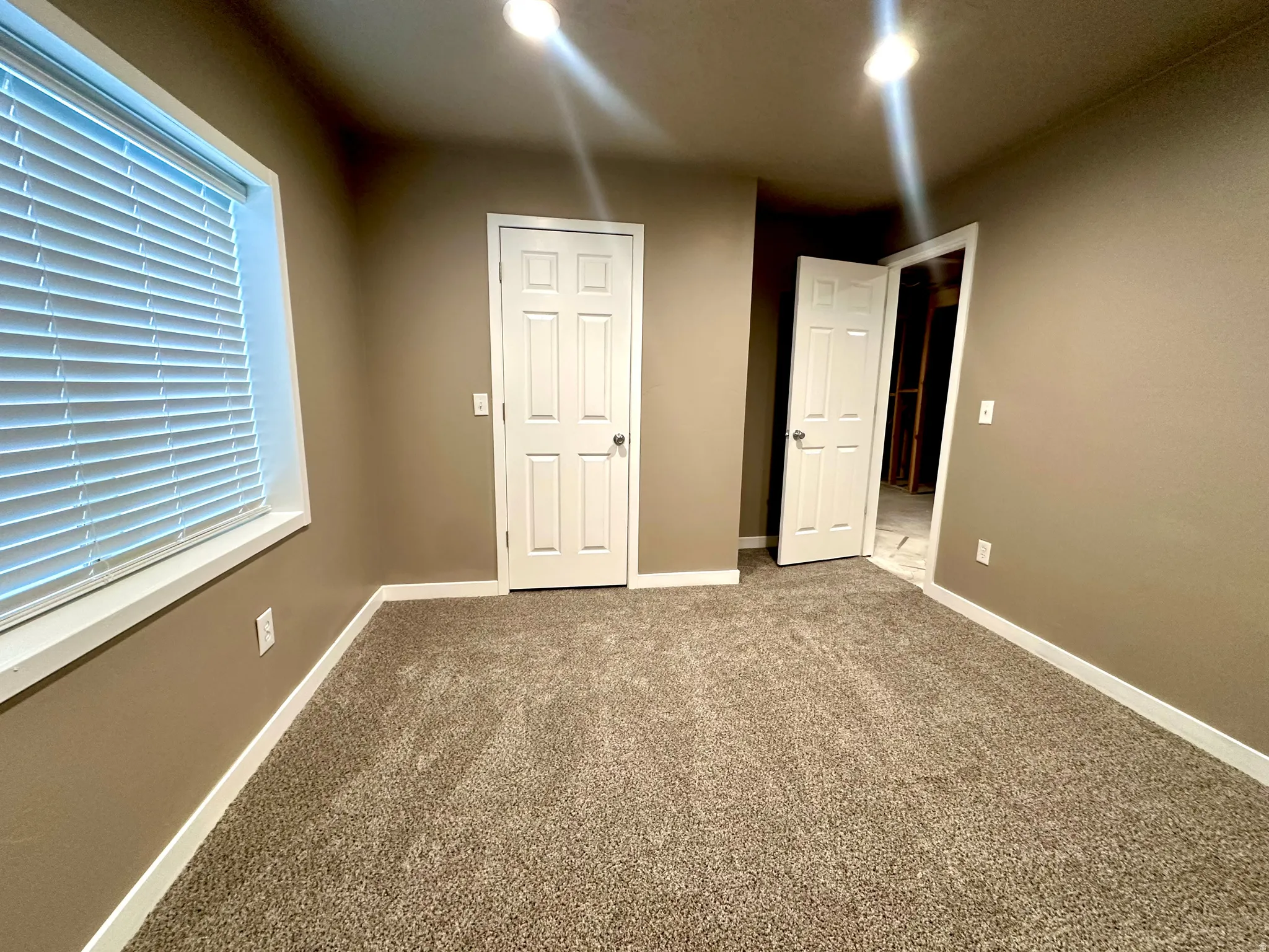 3rd bedroom with carpet floors