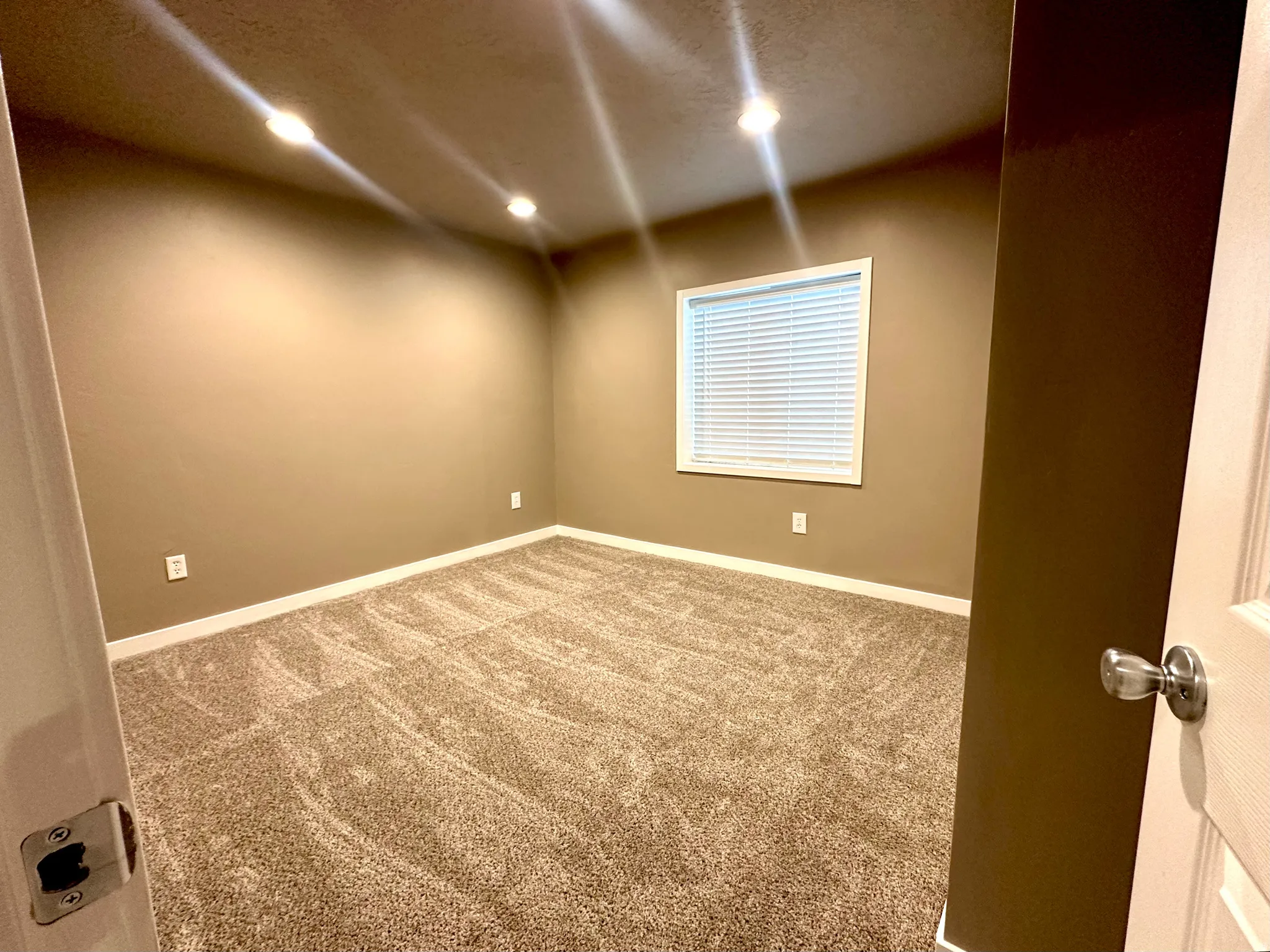 3rd Bedroom with light carpet and recessed lighting