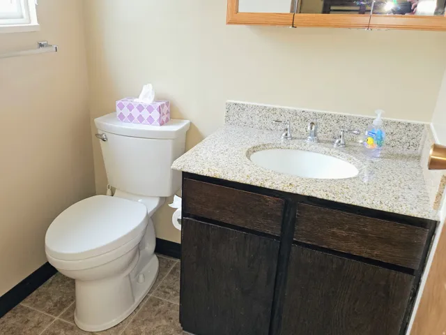 Bathroom featuring vanity and light tile patterned floors