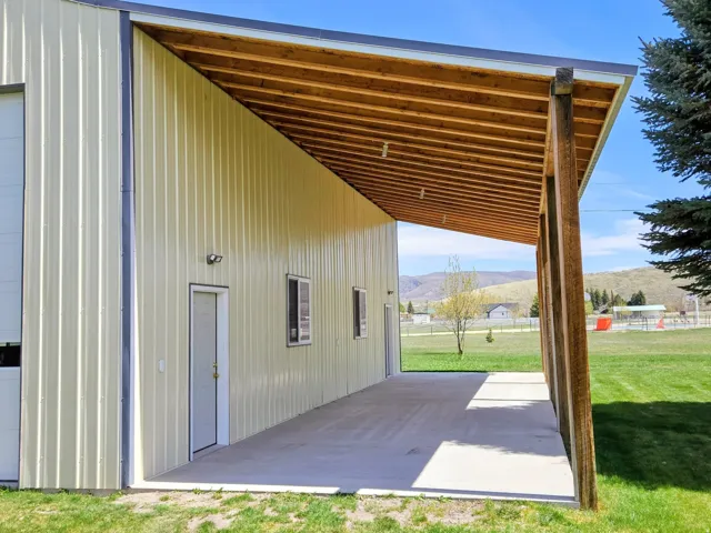 View of patio featuring a mountain view and a garage