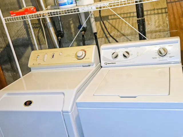 Laundry area featuring separate washer and dryer