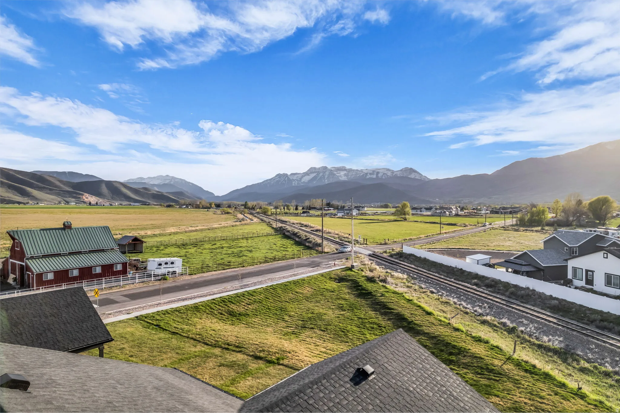 View of mountain background featuring rural landscape