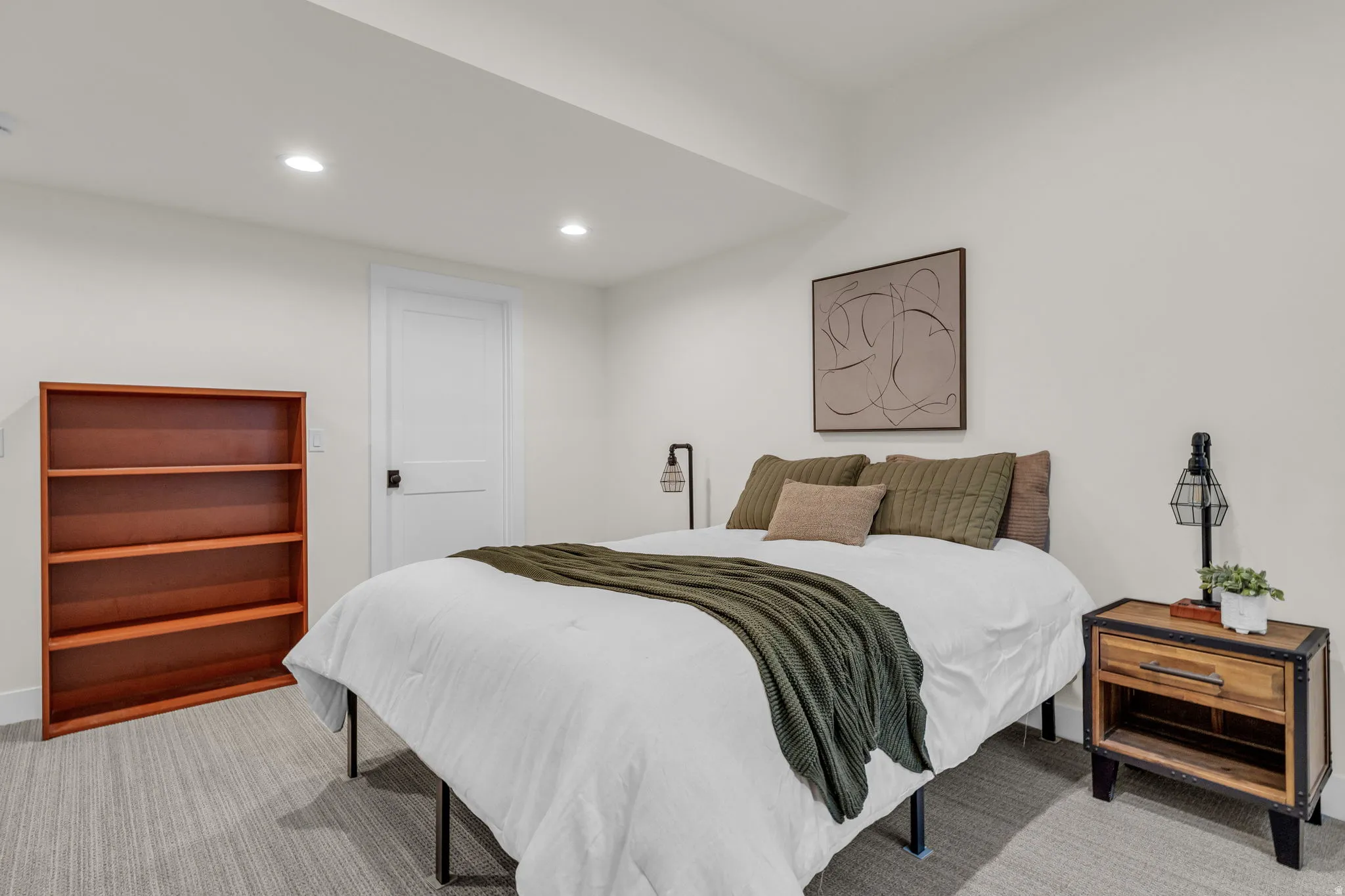 Bedroom featuring recessed lighting and light carpet