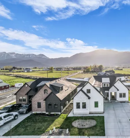 Aerial view of residential area with mountains