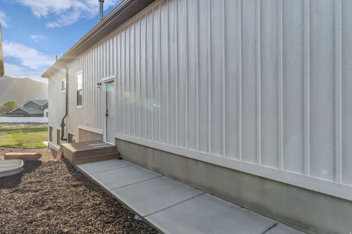 View of home's exterior featuring board and batten siding