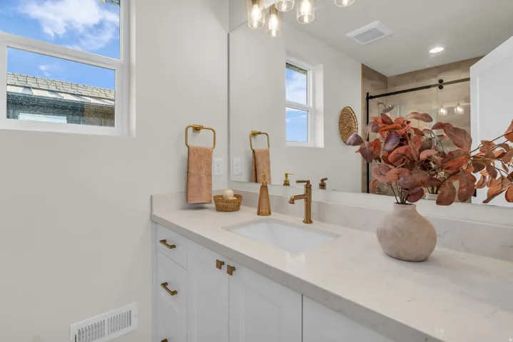Full bathroom featuring vanity