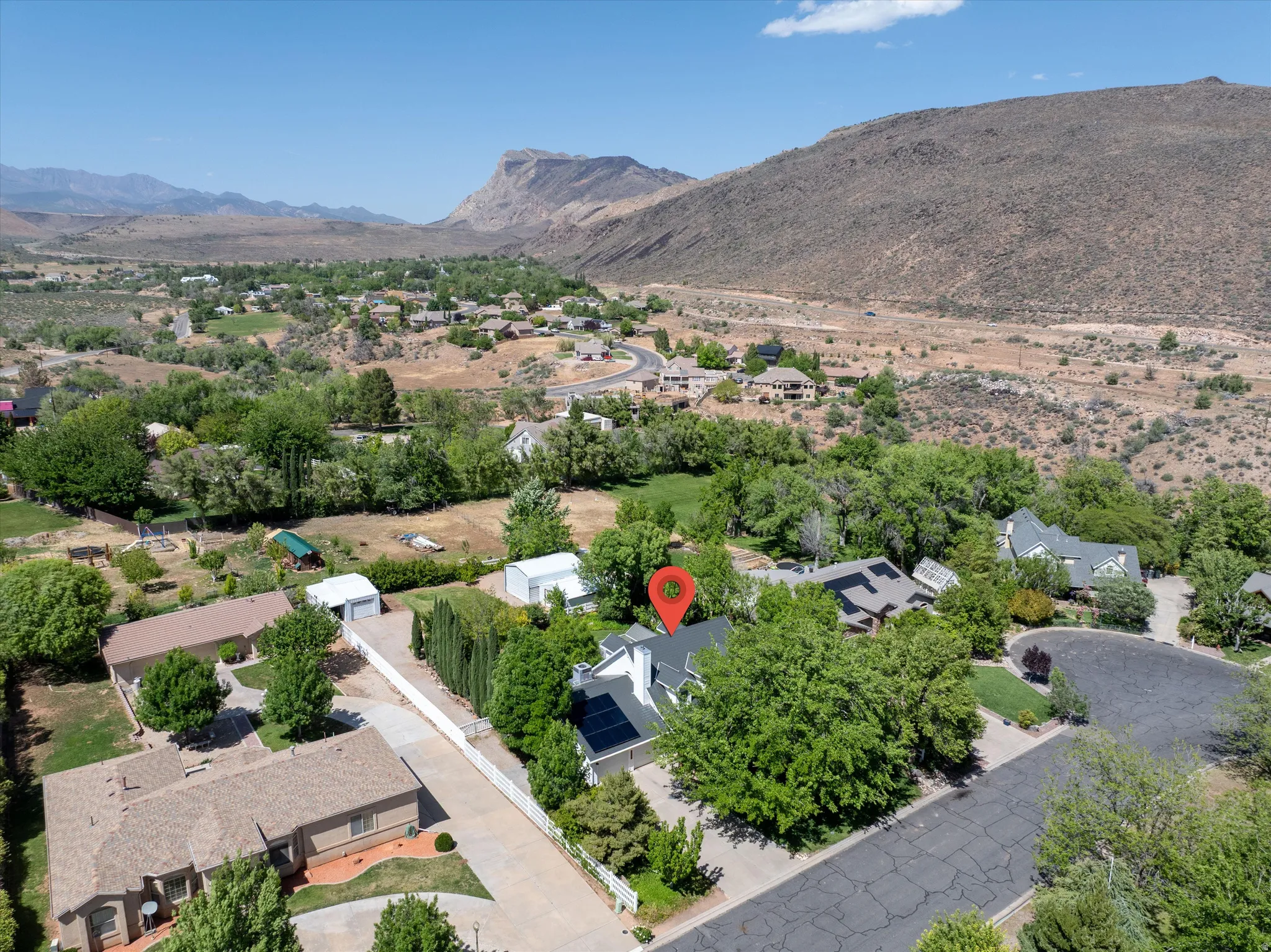 Aerial perspective of suburban area with mountains