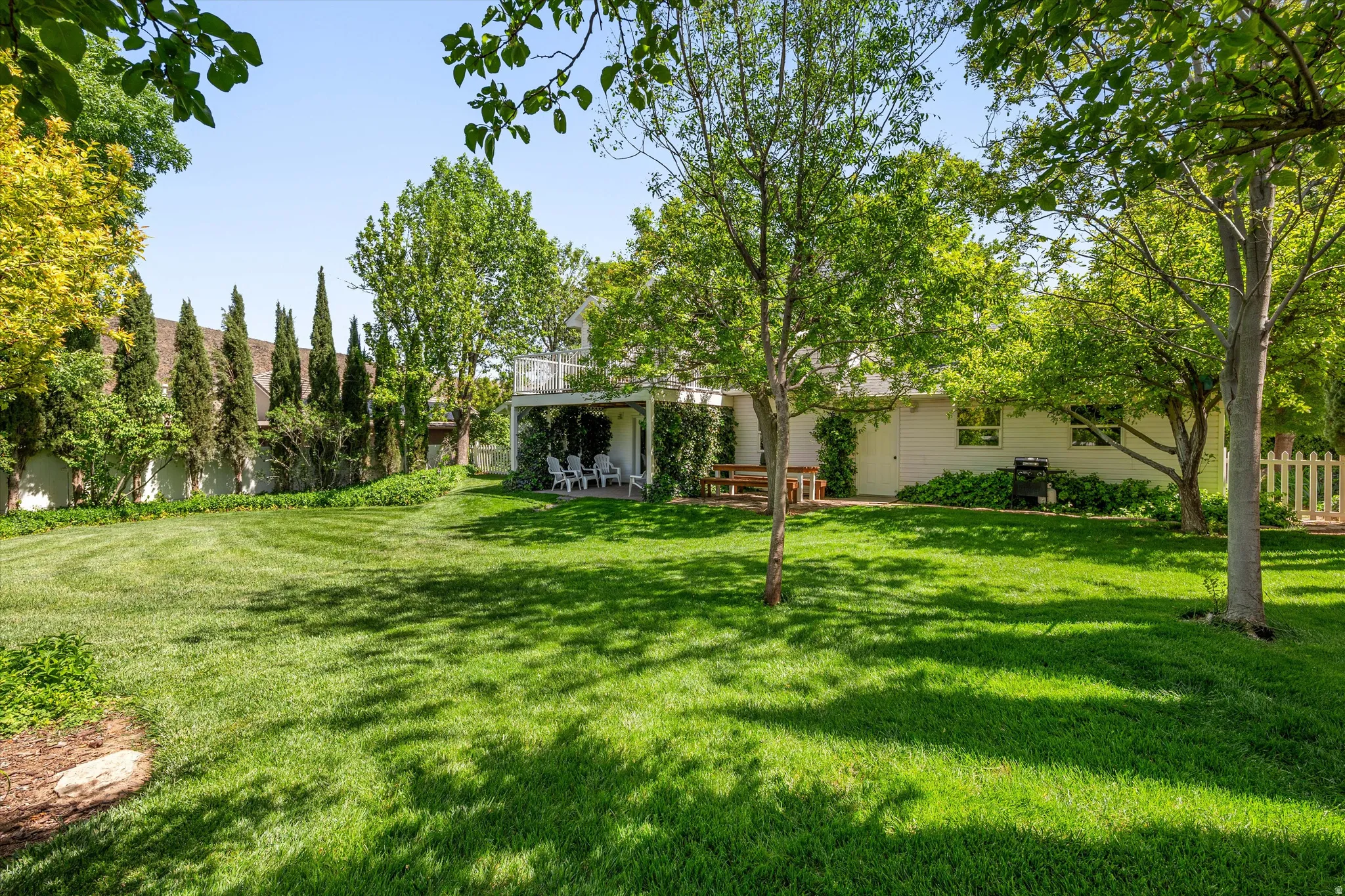 Fenced yard featuring a patio