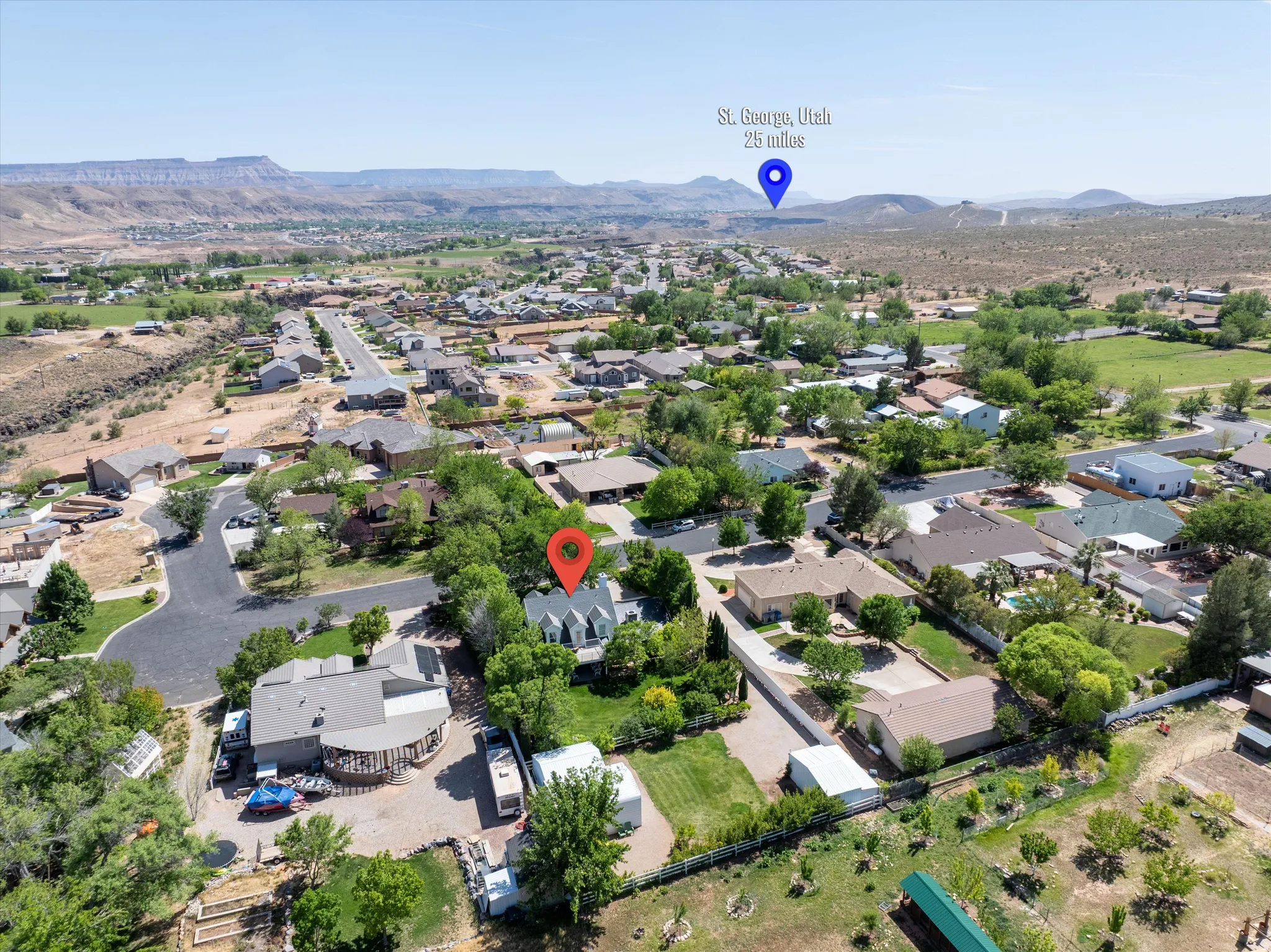 Aerial view of residential area with mountains