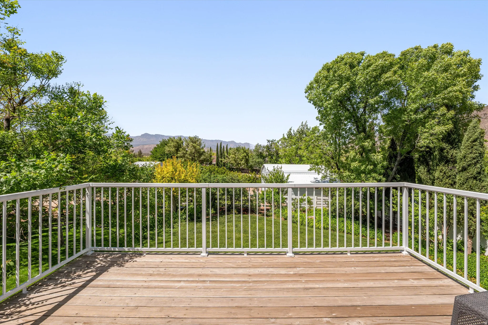 Wooden deck featuring a mountain view
