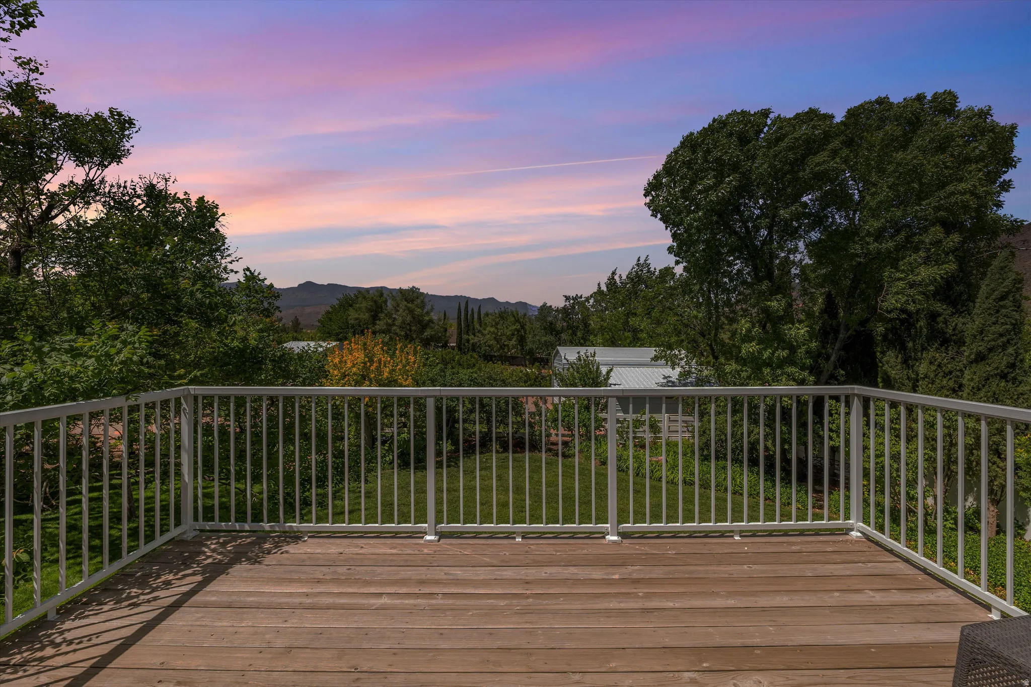 View of deck at dusk