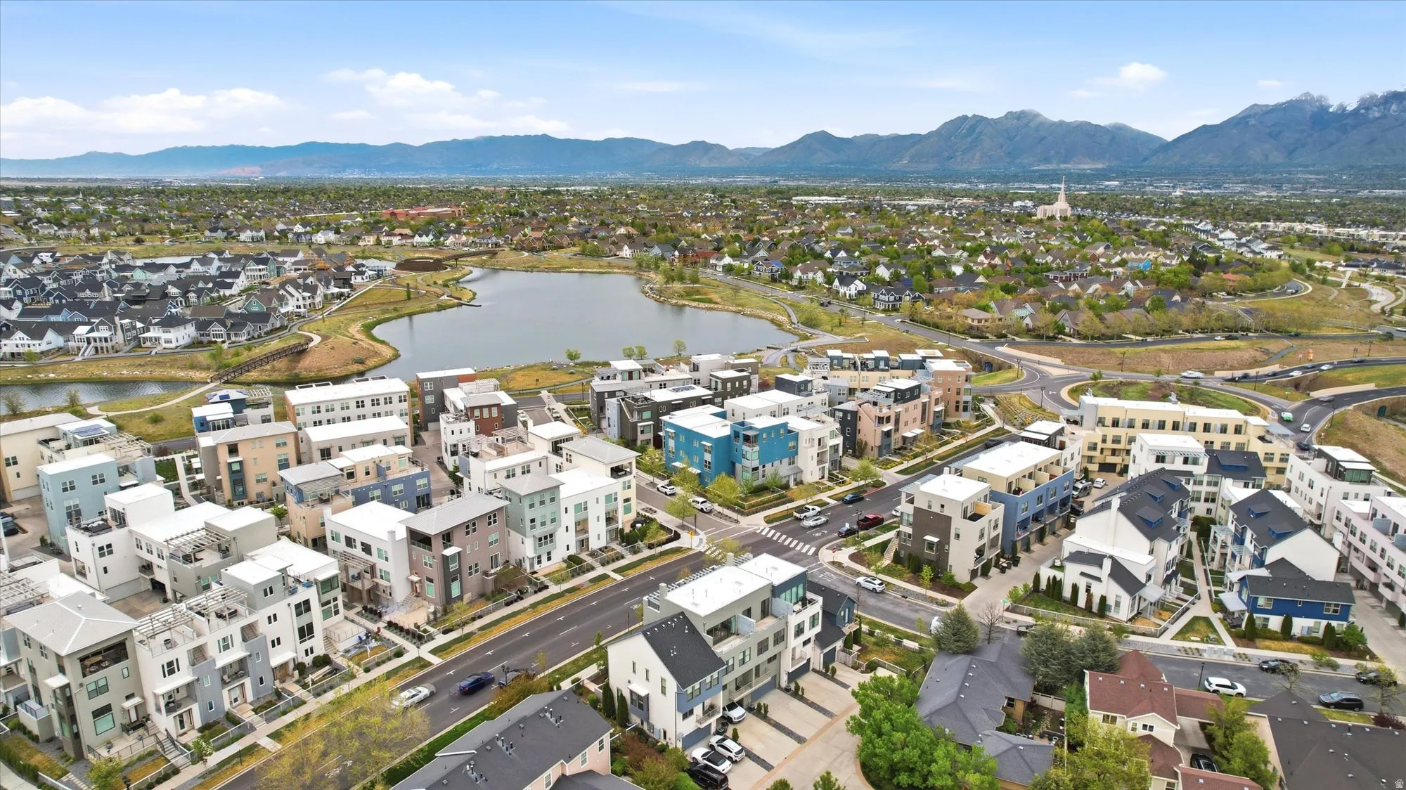 Aerial view of residential area with a water and mountain view