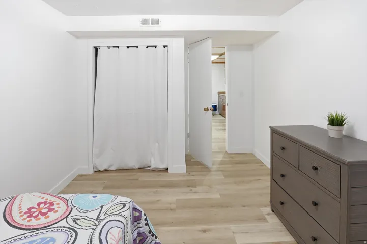 Bedroom with light wood-style flooring