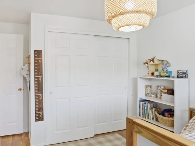 Bedroom featuring a closet and light wood-type flooring