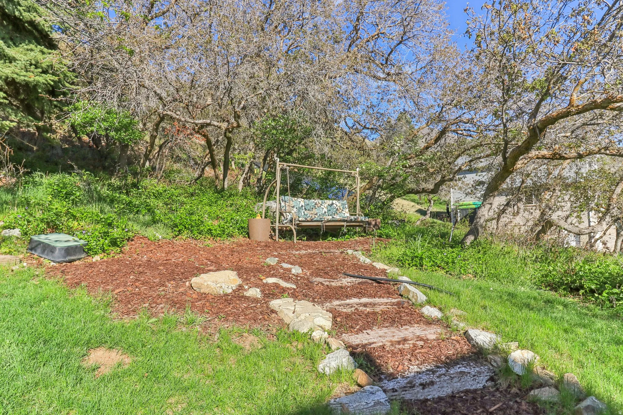 View of yard featuring view of wooded area