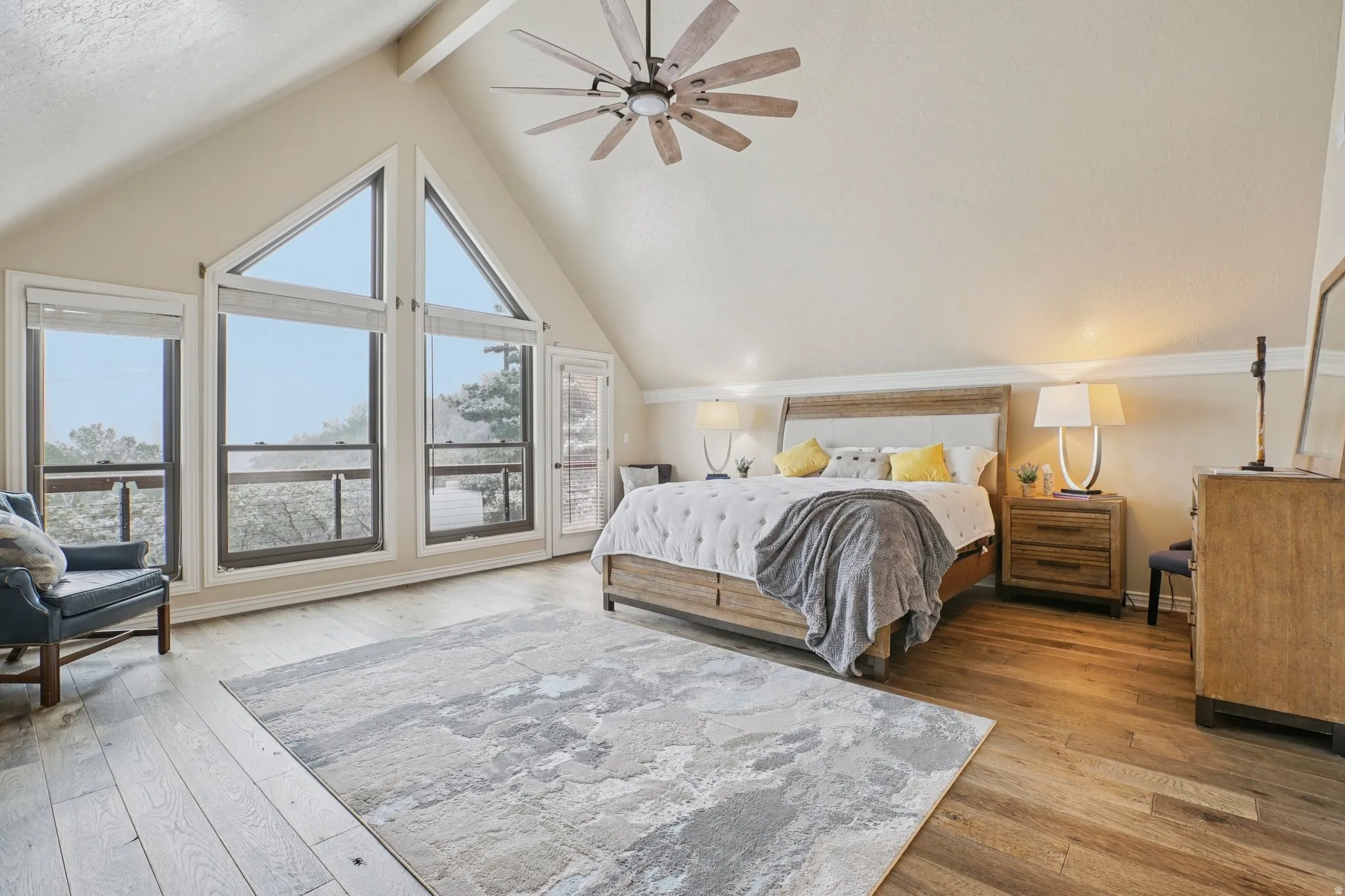 Bedroom featuring ceiling fan, light wood-style flooring, and access to outside