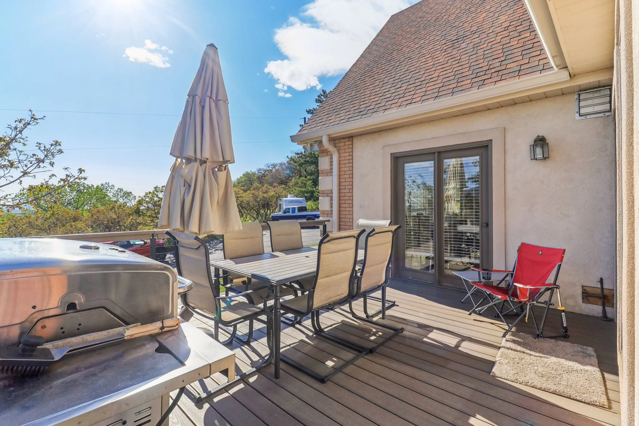 Wooden terrace with outdoor dining area