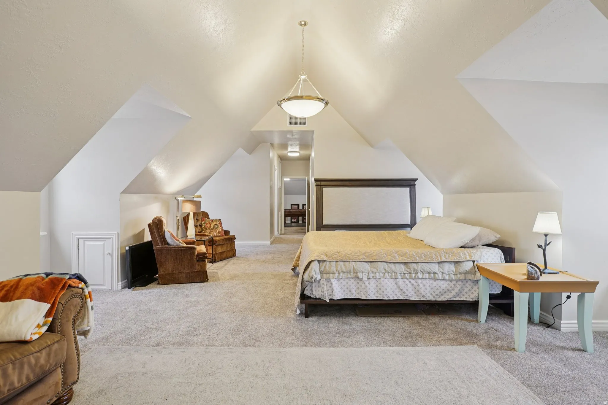 Bedroom with light carpet