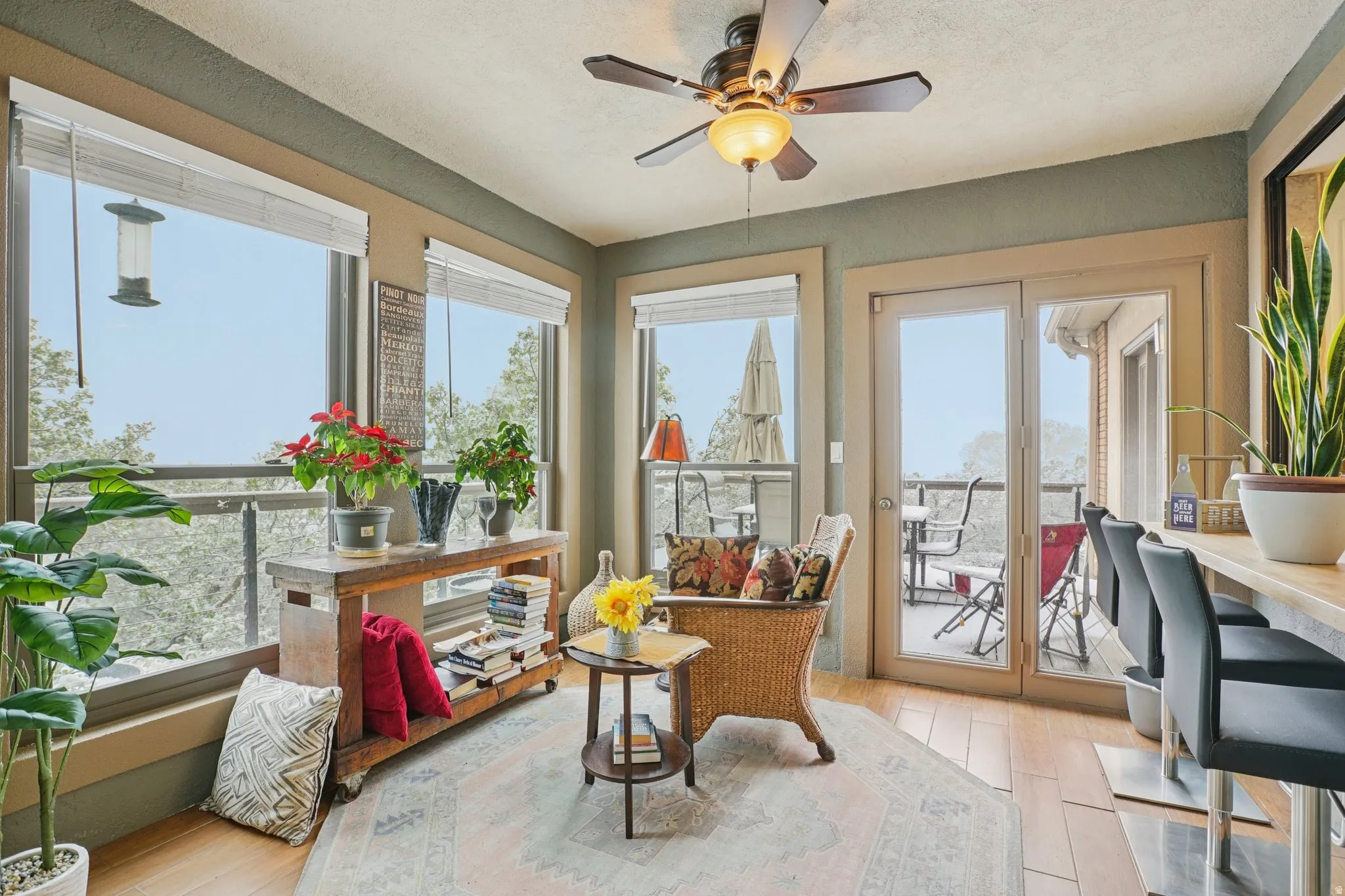 Sunroom with wood finished floors