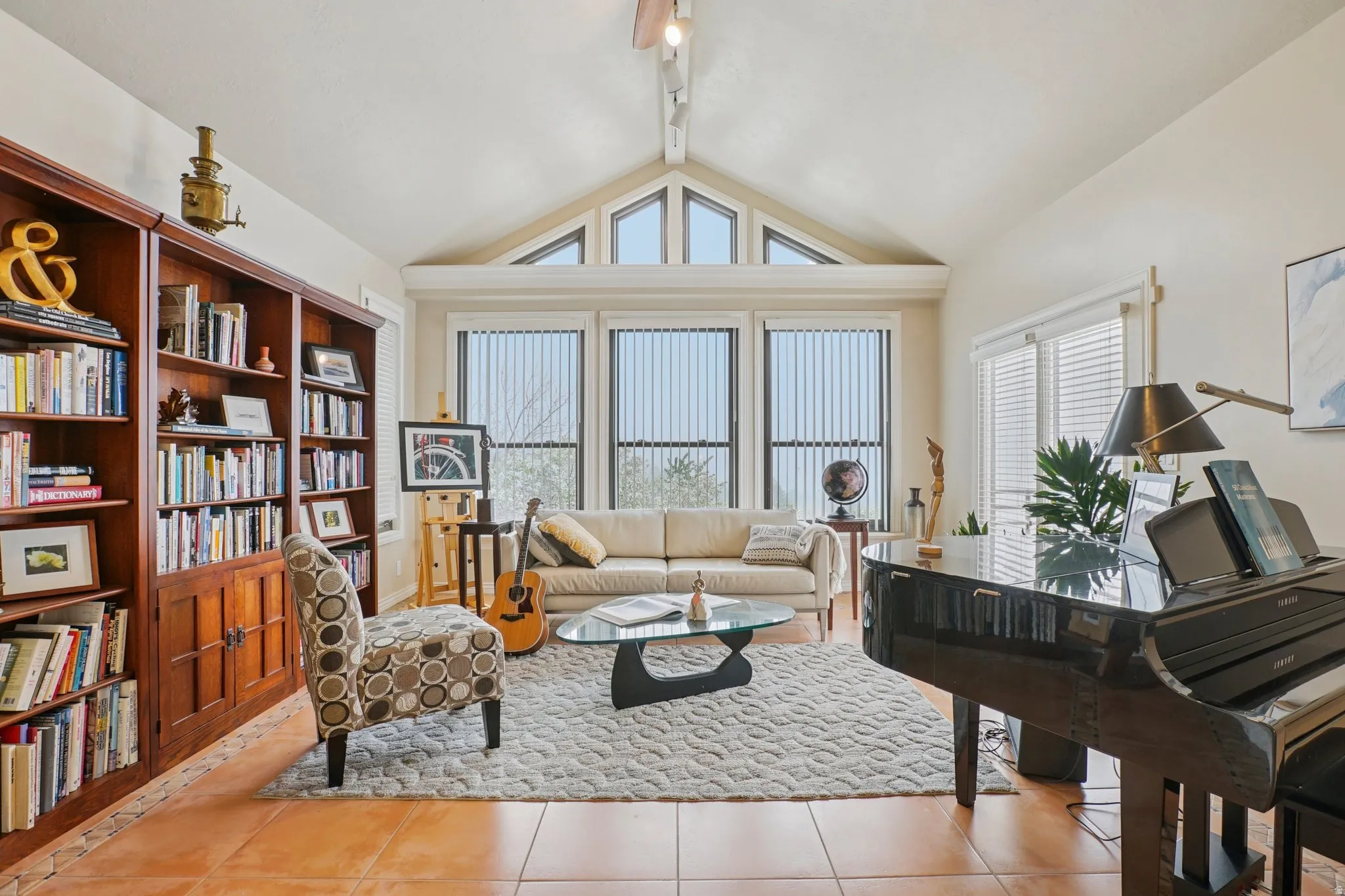 Living area with light tile patterned floors