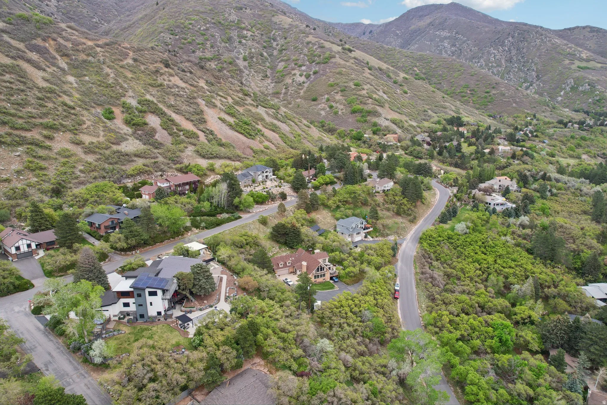 Aerial perspective of suburban area with mountains