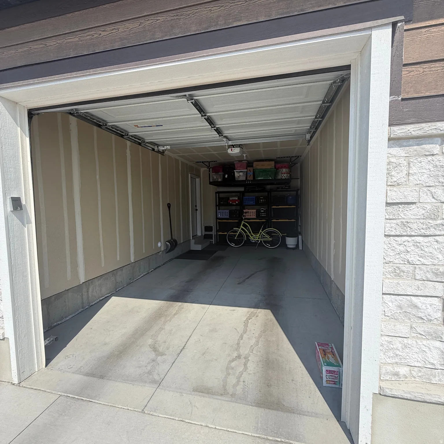 Large 1 car garage with lots of overhead storage