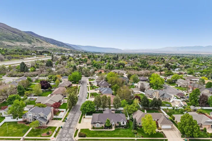 Aerial view of residential area with a mountain backdrop