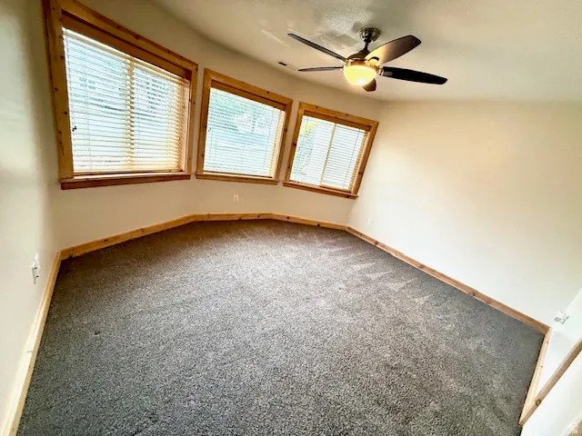Bedroom in the basement with large bay windows
