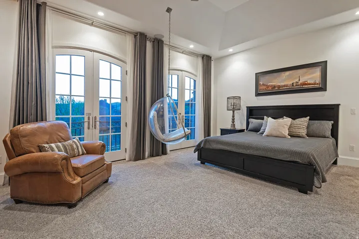 Carpeted bedroom featuring french doors, access to exterior, and recessed lighting