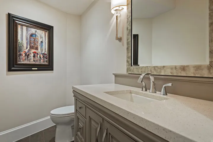 Bathroom featuring vanity and dark wood-style floors