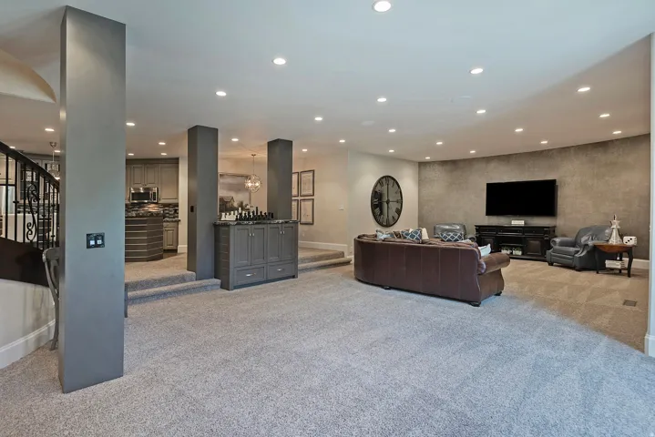 Living room featuring recessed lighting and light carpet