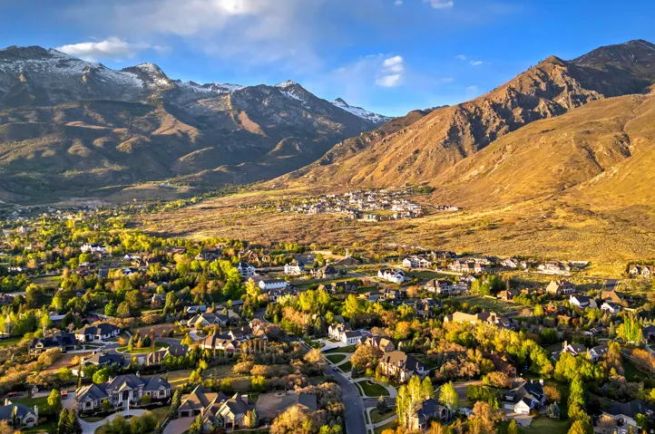 View of mountain backdrop with nearby suburban area