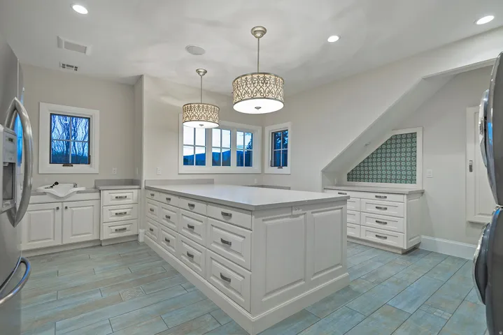 Walk in closet featuring wood finish floors
