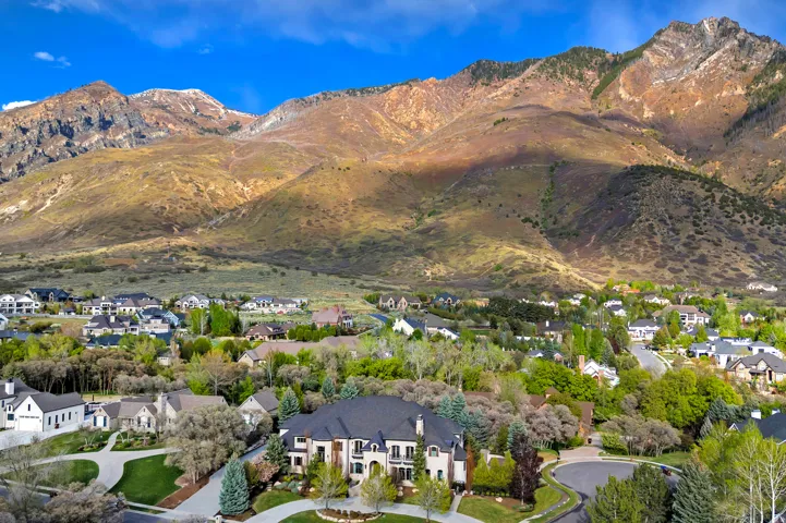 Aerial view of residential area with a mountain backdrop