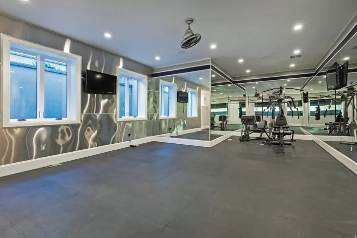 Gym featuring recessed lighting