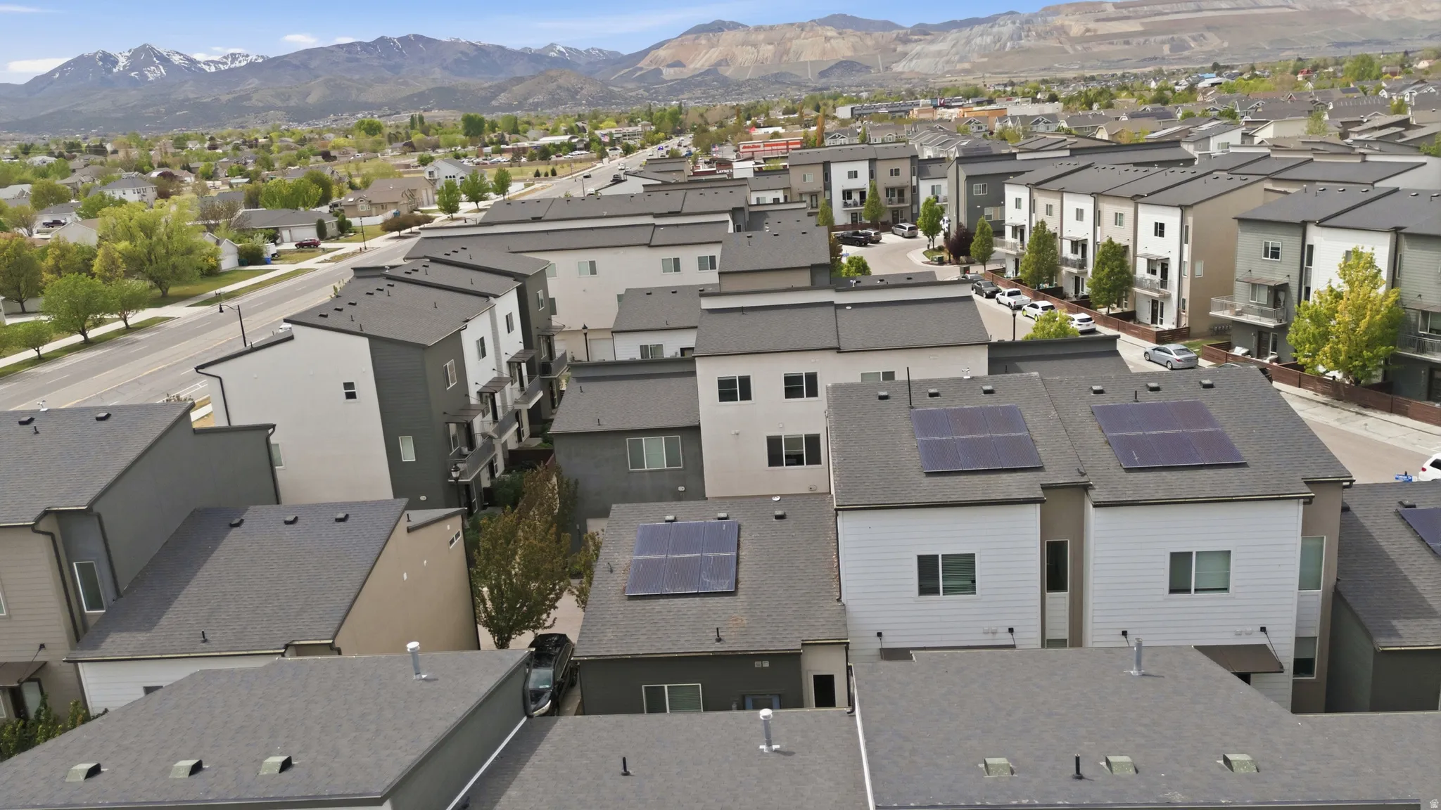 Aerial perspective of suburban area with mountains