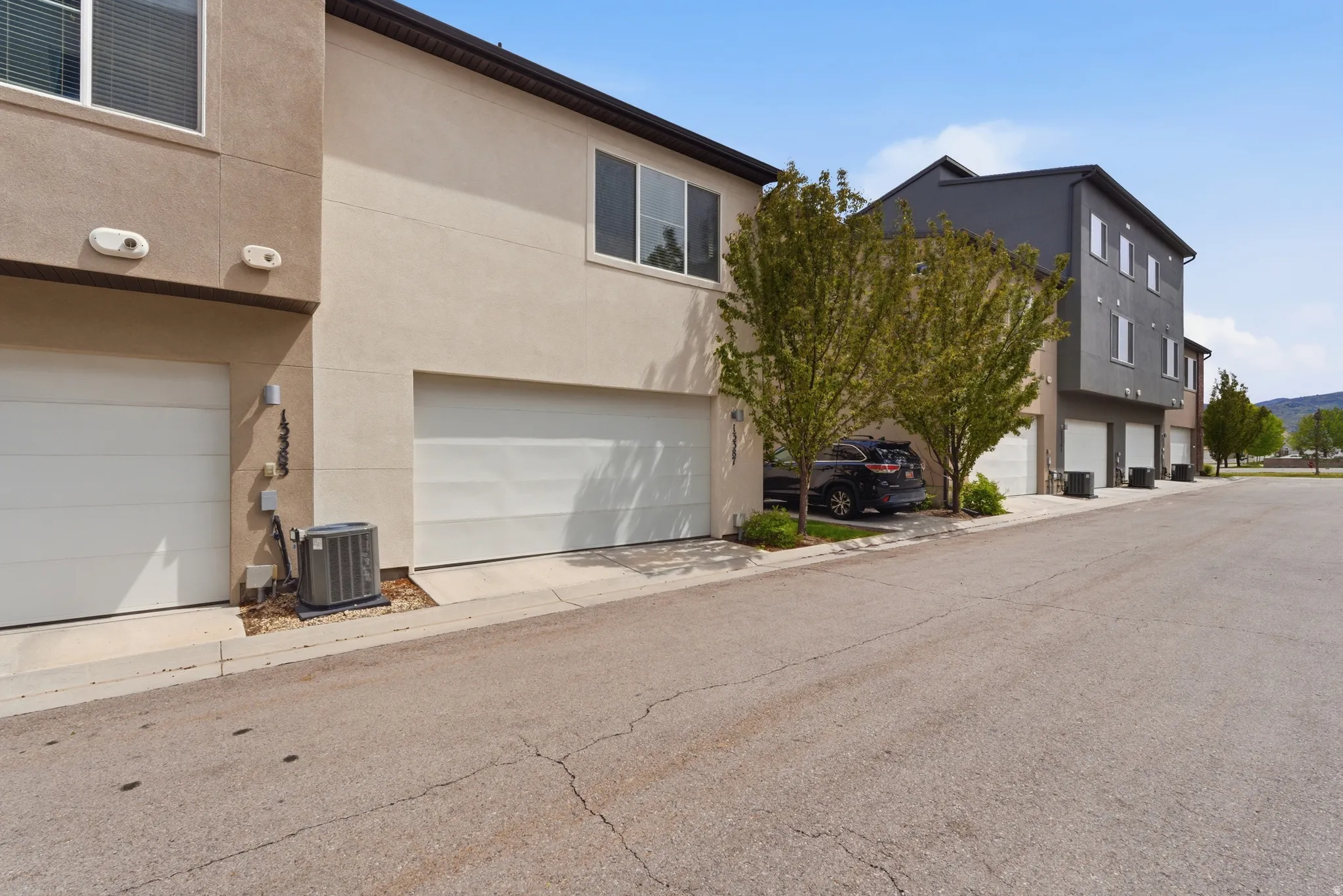 View of property featuring an attached garage