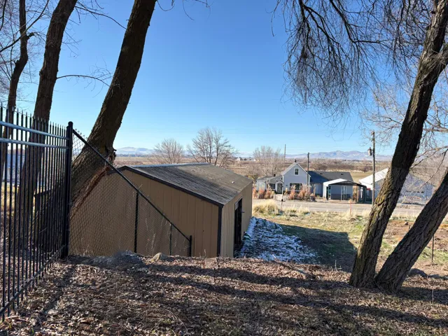 View of outbuilding featuring a mountain view