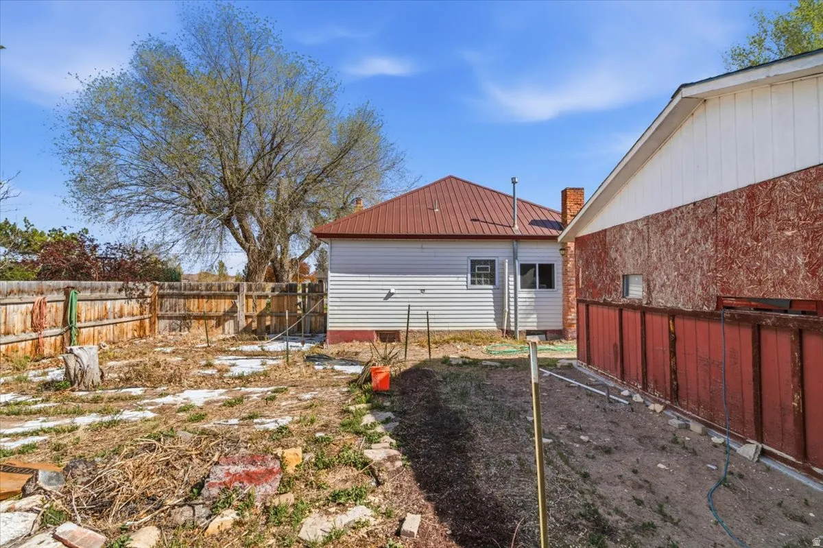 View of fenced backyard