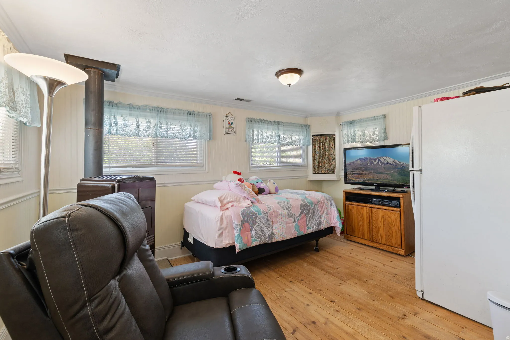 Family room/bonus room with coal/wood burning stove