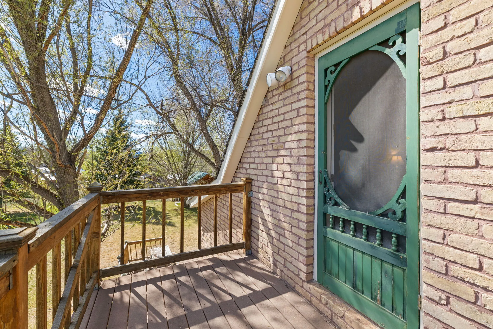 Outdoor balcony off upstairs bedroom