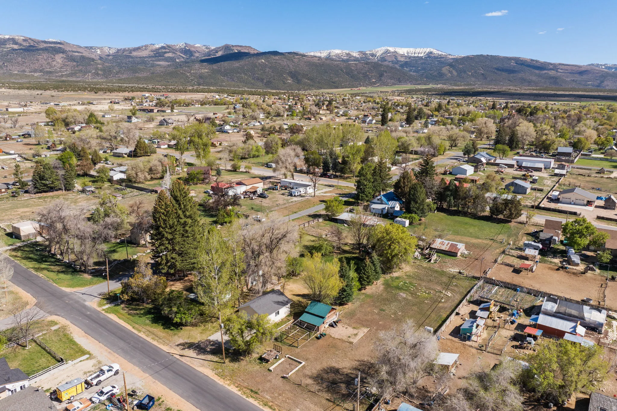 Aerial view of residential area featuring mountains