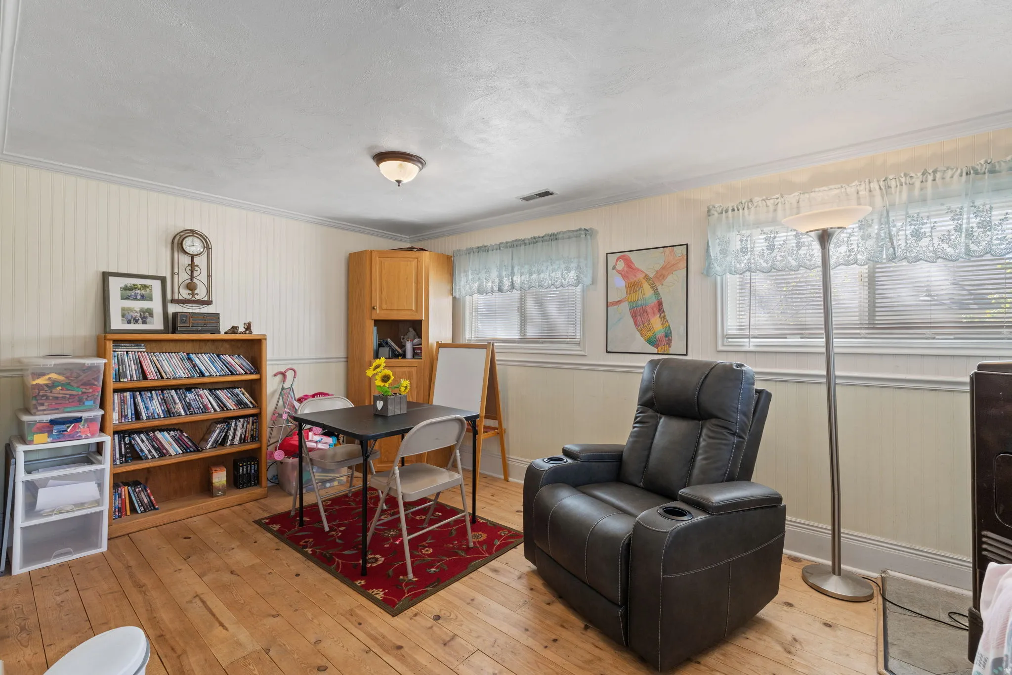 Family room/bonus room with coal/wood burning stove