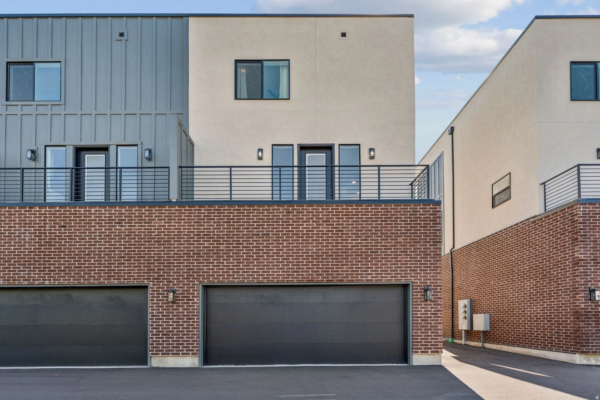 View of property featuring an attached garage