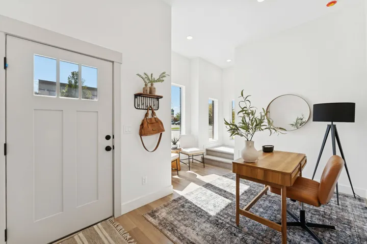 Entrance foyer featuring light wood finished floors and recessed lighting