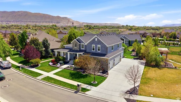 Aerial view of residential area with a mountainous background