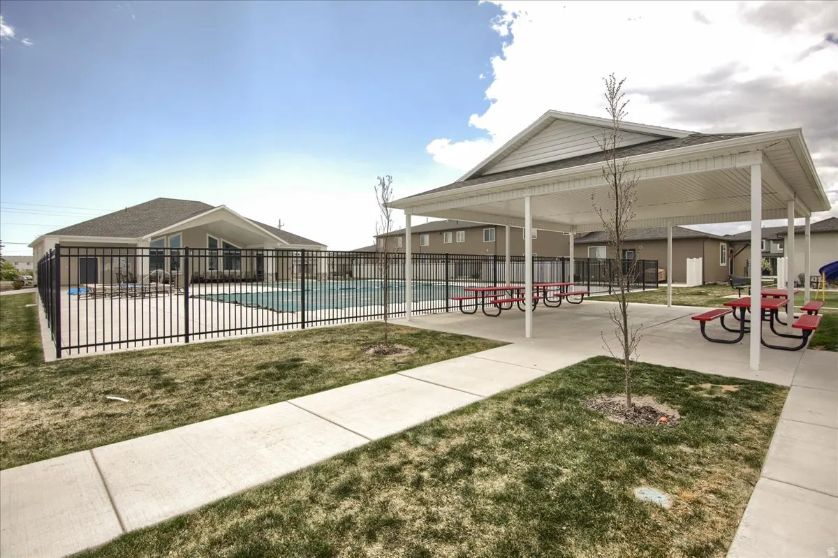 Community pool featuring a patio area
