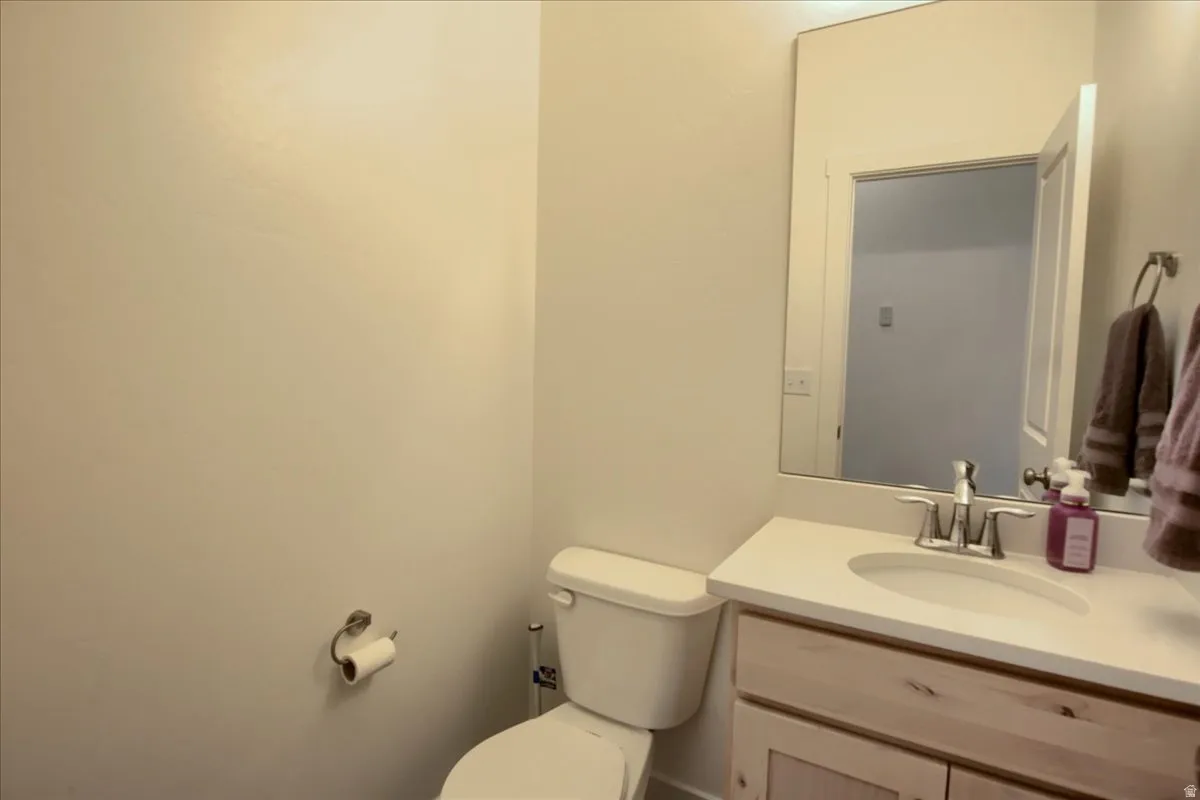 Bathroom with vanity and toilet