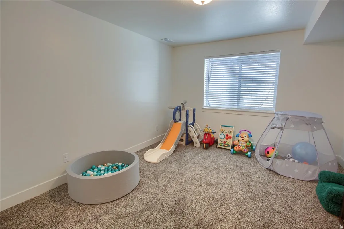 Recreation room featuring carpet